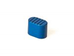 Blue metal oblong component with grooved top isolated on white background