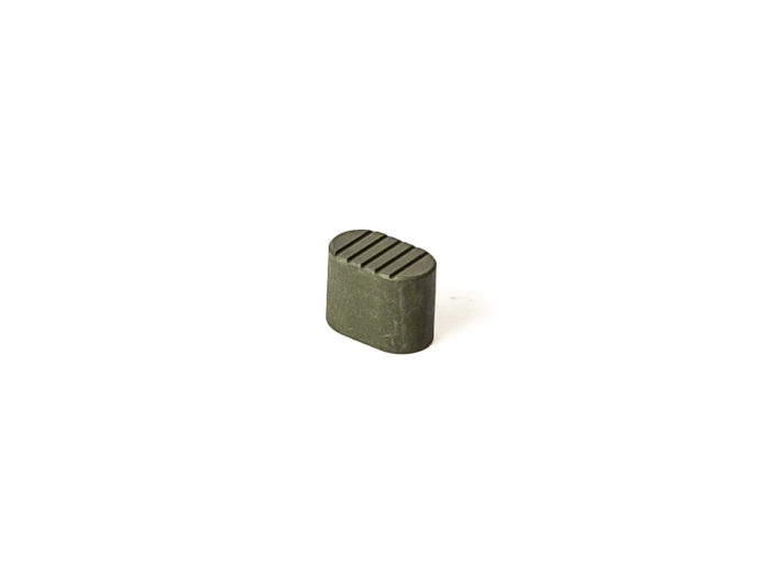 Green textured oval product with ridged top on a white background.