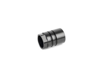 Black metal cylindrical gun part on a white background