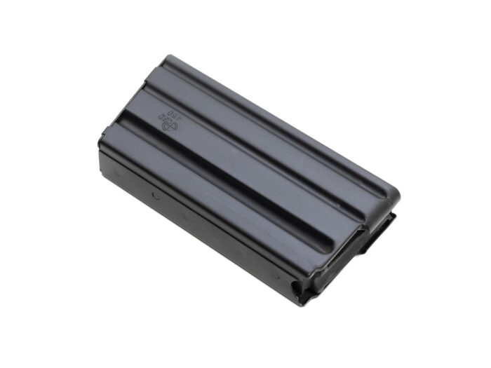 Black metal rifle magazine on white background.