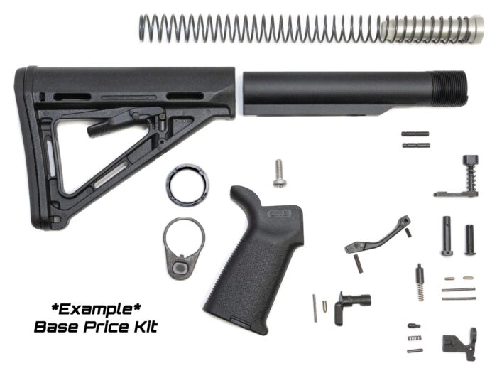 AR-15 lower parts kit with stock buffer tube grip springs and small components laid out.
