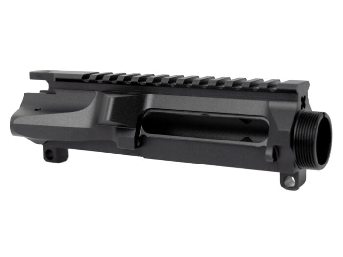 Black rifle upper receiver component with picatinny rail on white background