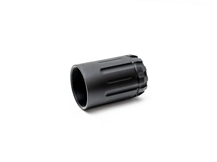 Black cylindrical metal firearm accessory on a white background