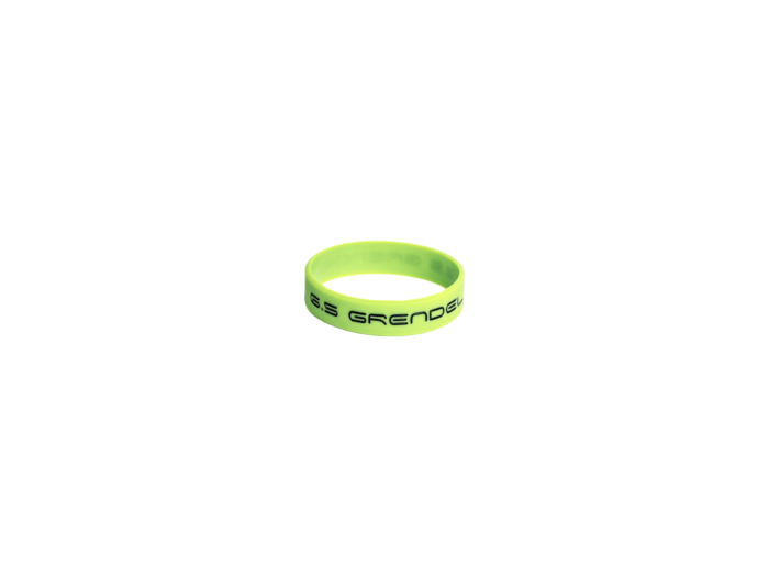 Neon green wristband labeled '6.5 Grendel' on a white background.