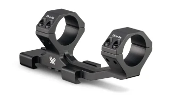 Black 30mm cantilever scope mount with torque specifications engraved on the rings.