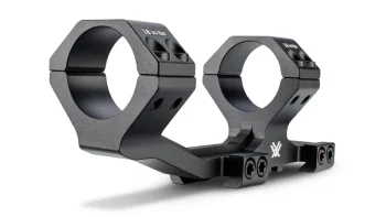 Black cantilever mount for 30mm scope shown angled on white background.
