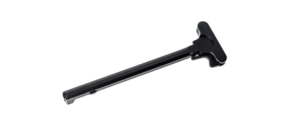 A clean product shot displaying a single, standard Mil-Spec style charging handle for an AR-15 platform. The component features a classic non-ambidextrous single-latch design, a matte black finish, and an all-aluminum construction laid out against a pure white backdrop.